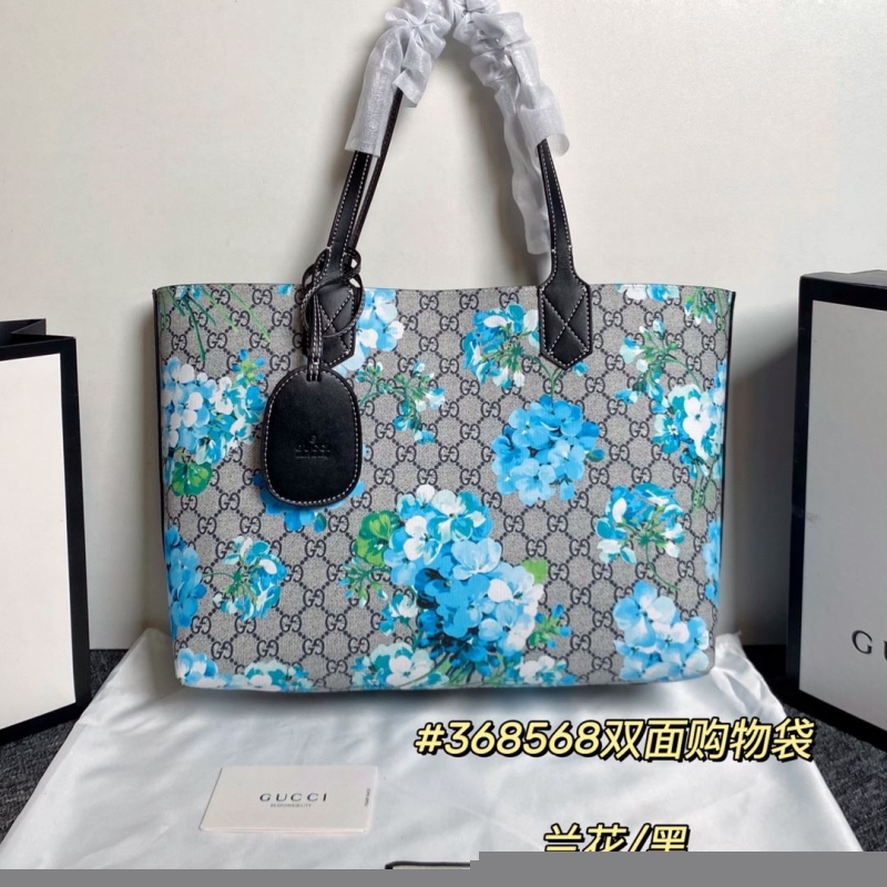 G*u*i shopping bags